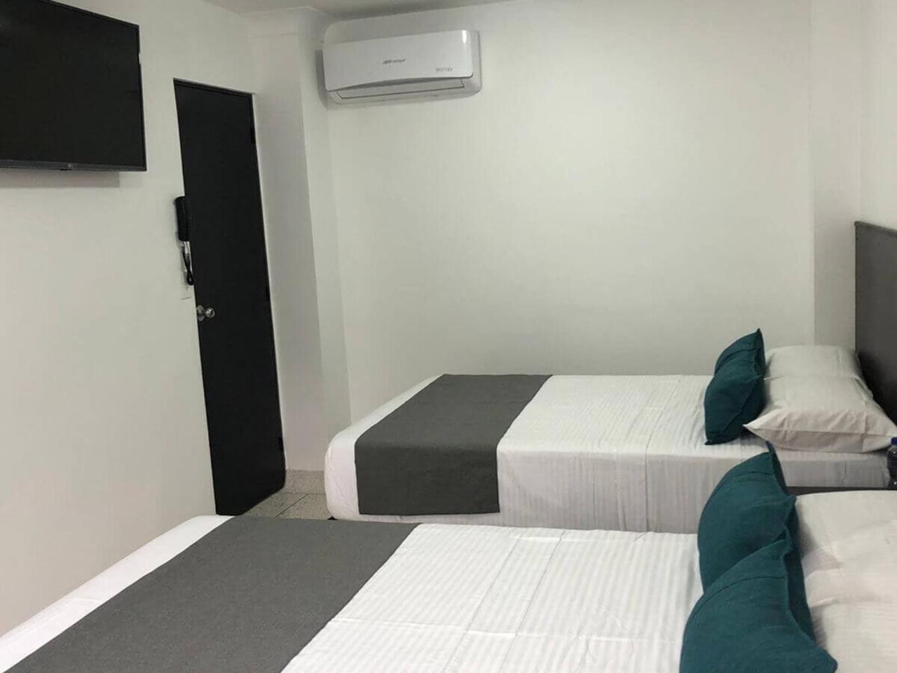 Hotel Mar Inn Cali Bagian luar foto