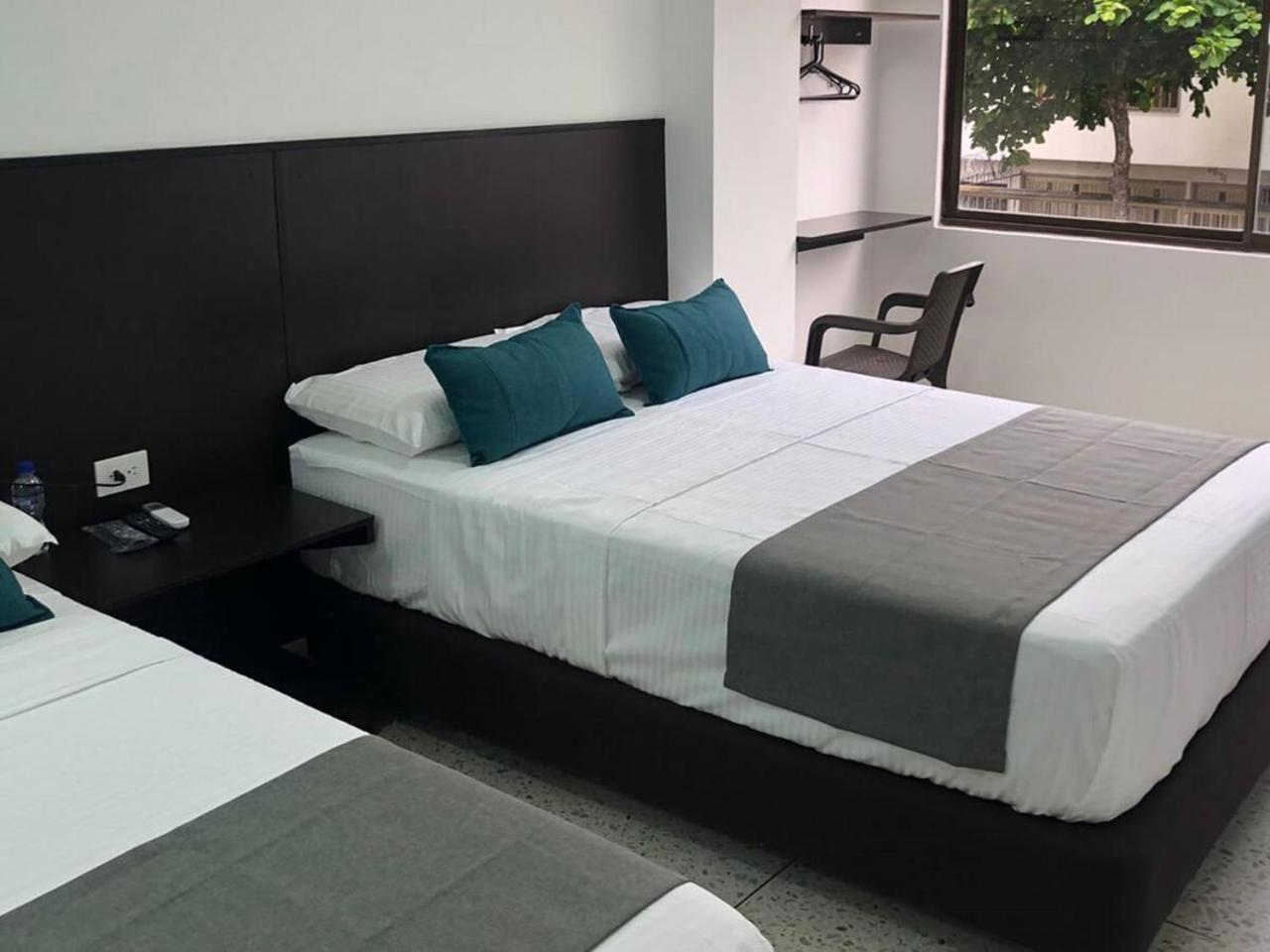 Hotel Mar Inn Cali Bagian luar foto